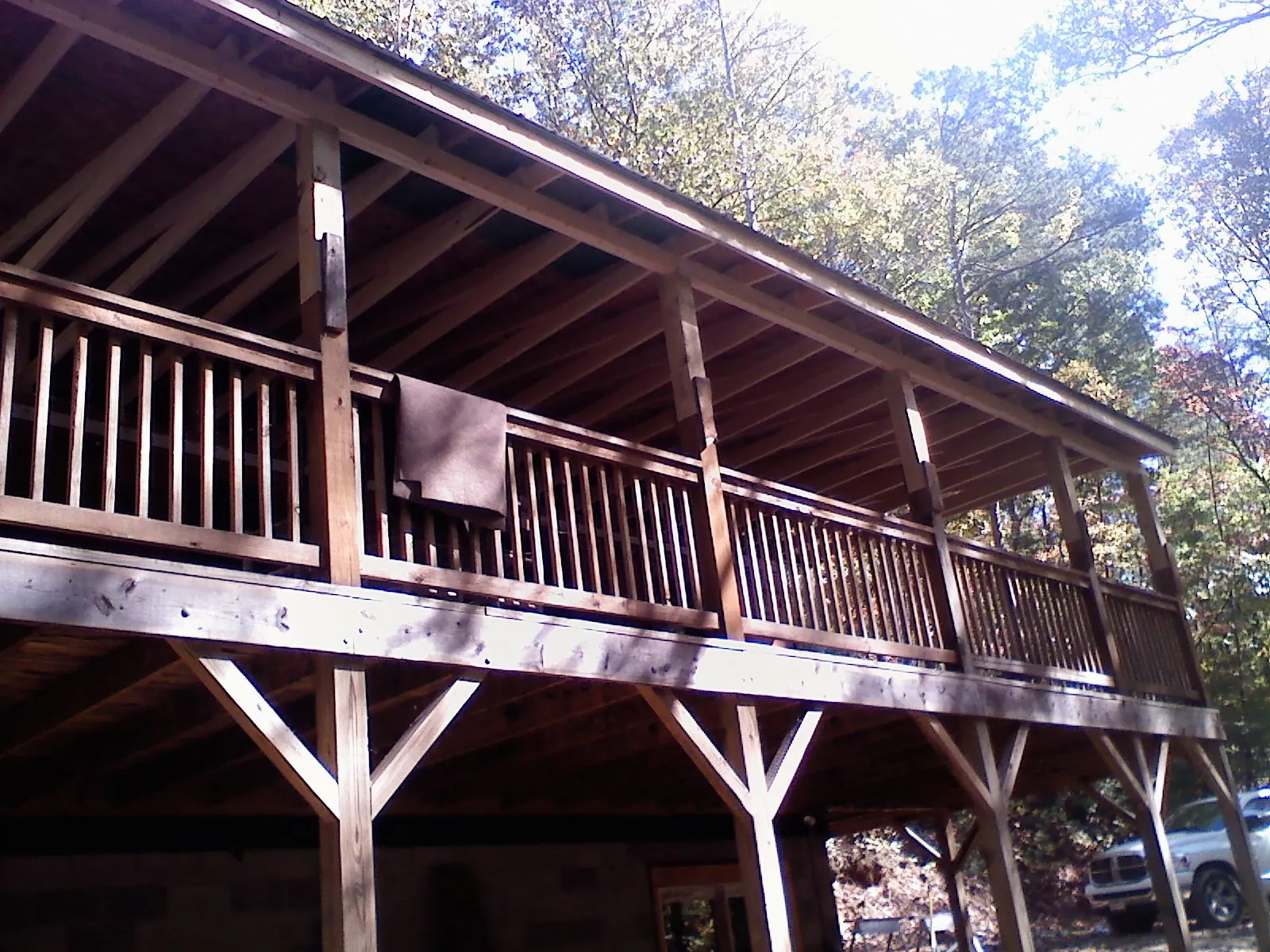 Timber framing under a new elevated porch and deck — Roof Leak Repair in Libertyville by Roofing Brothers
